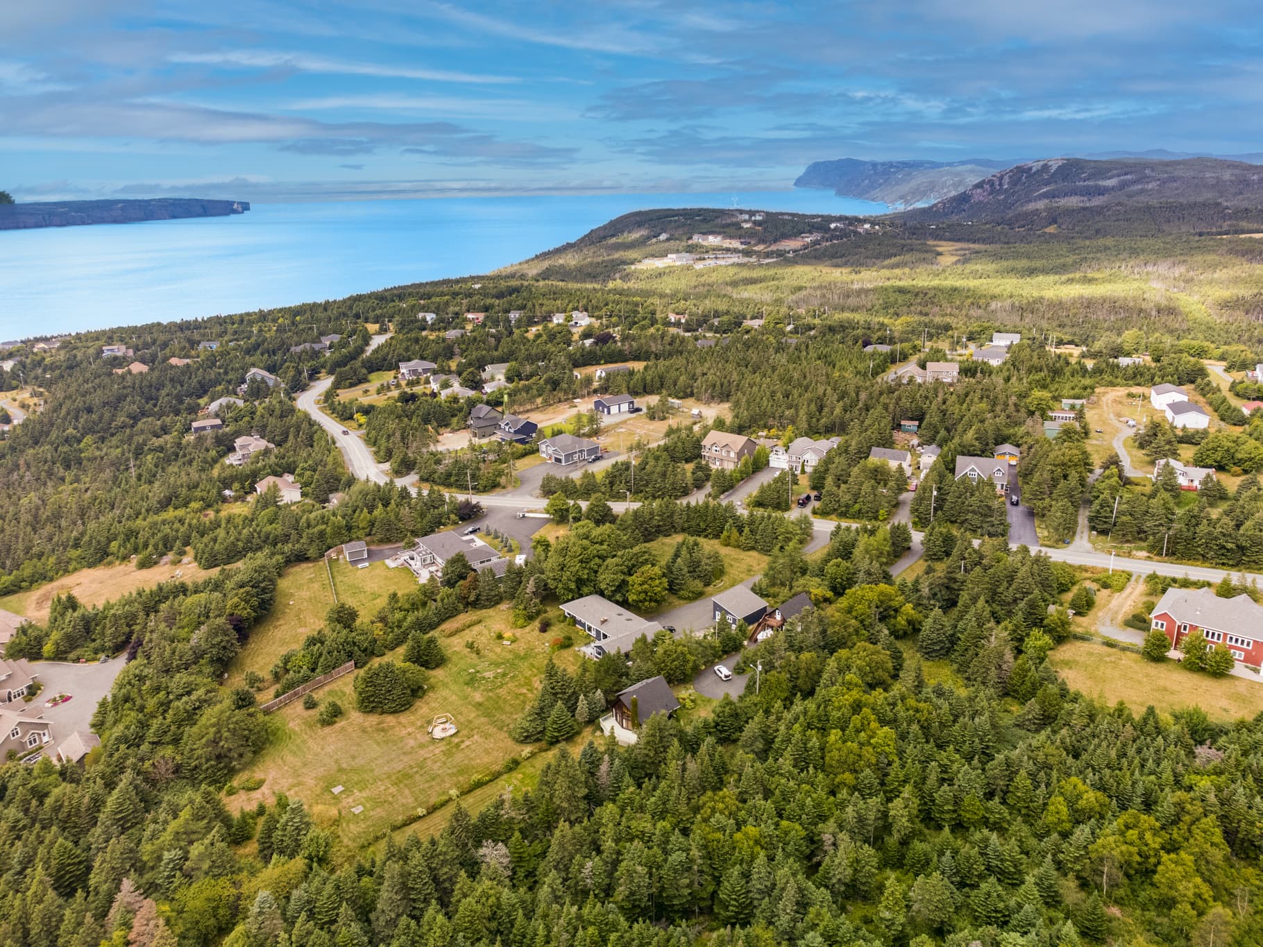 Expansive aerial showing sea and cliffs